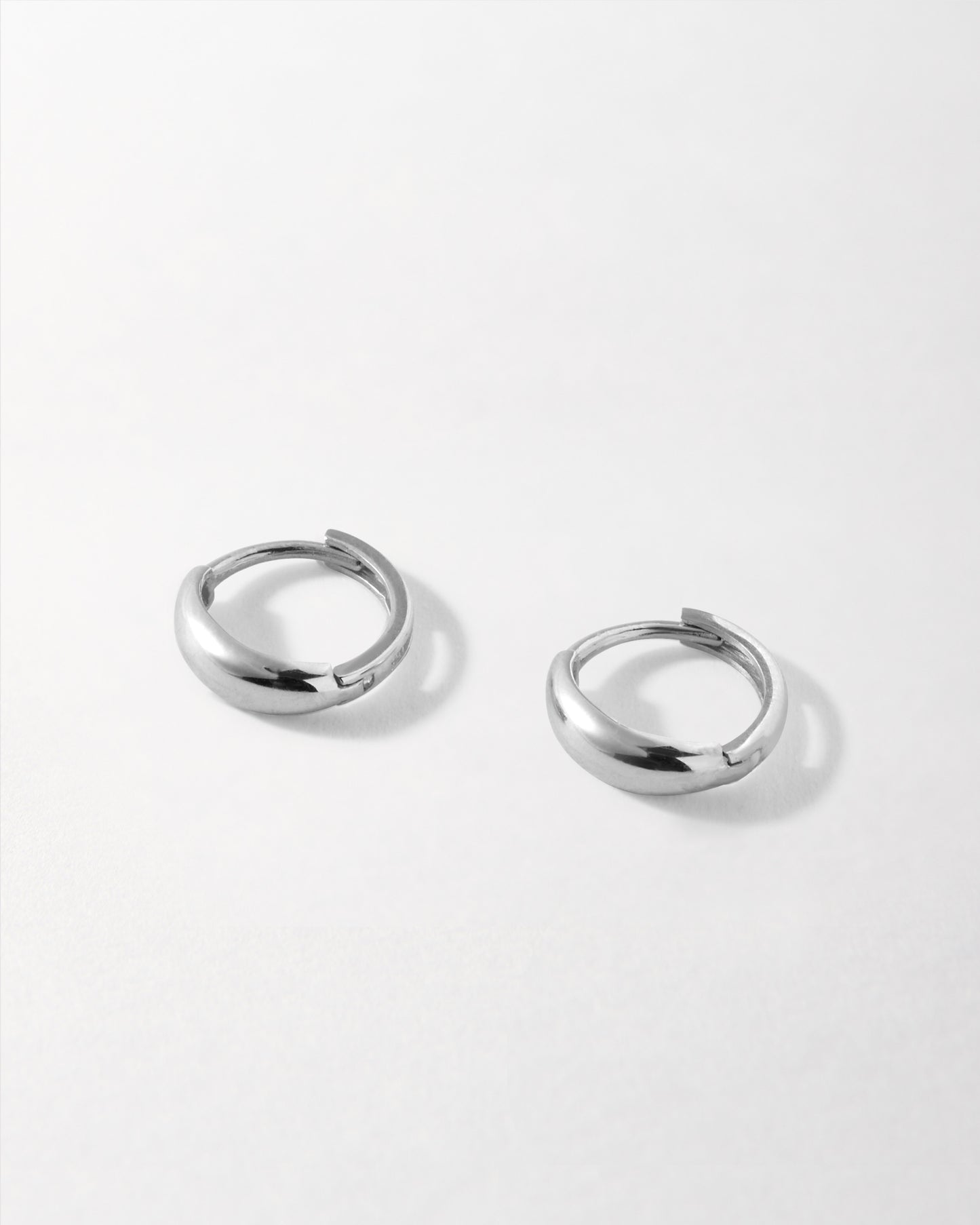 Bold Huggie Earrings - White Gold