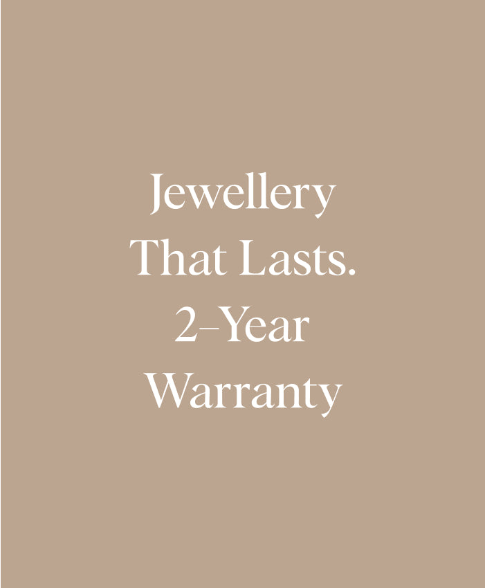 Text on a beige background reading "Jewellery That Lasts. 2-Year Warranty" promoting durable, ethically sourced fine jewellery made from recycled metals and solid gold.