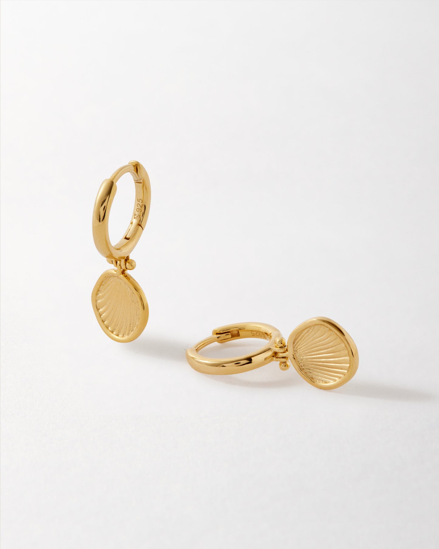 Coastal Shell Earrings featuring gold-plated sterling silver stud design inspired by nature, crafted with recycled metals for ethical, fine jewellery built to last.