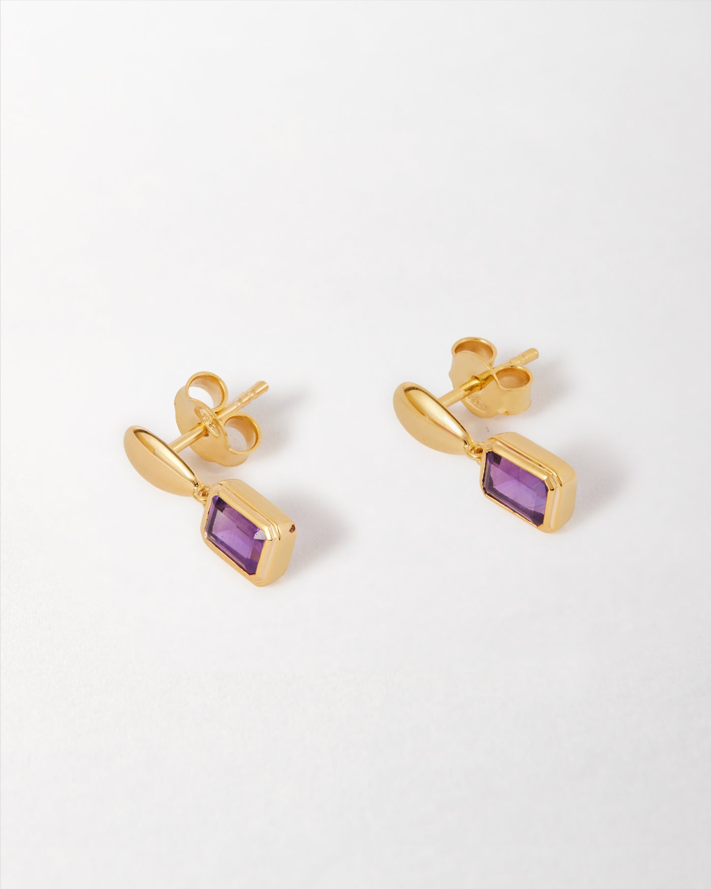 Pebble Amethyst February Birthstone Drop Earrings featuring gold-plated sterling silver with a dangle design, crafted using recycled metals for considered, everyday fine jewellery.