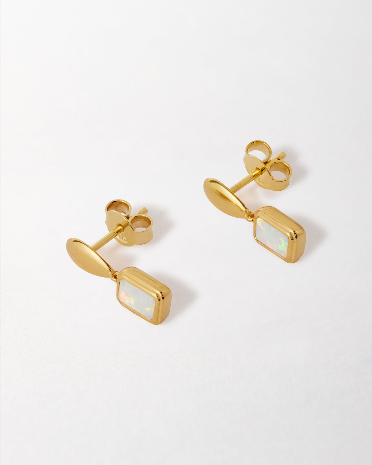 Pebble Opal October Birthstone Drop Earrings featuring dangle design in gold-plated sterling silver, crafted with recycled metals and ethically sourced materials for considered jewellery.