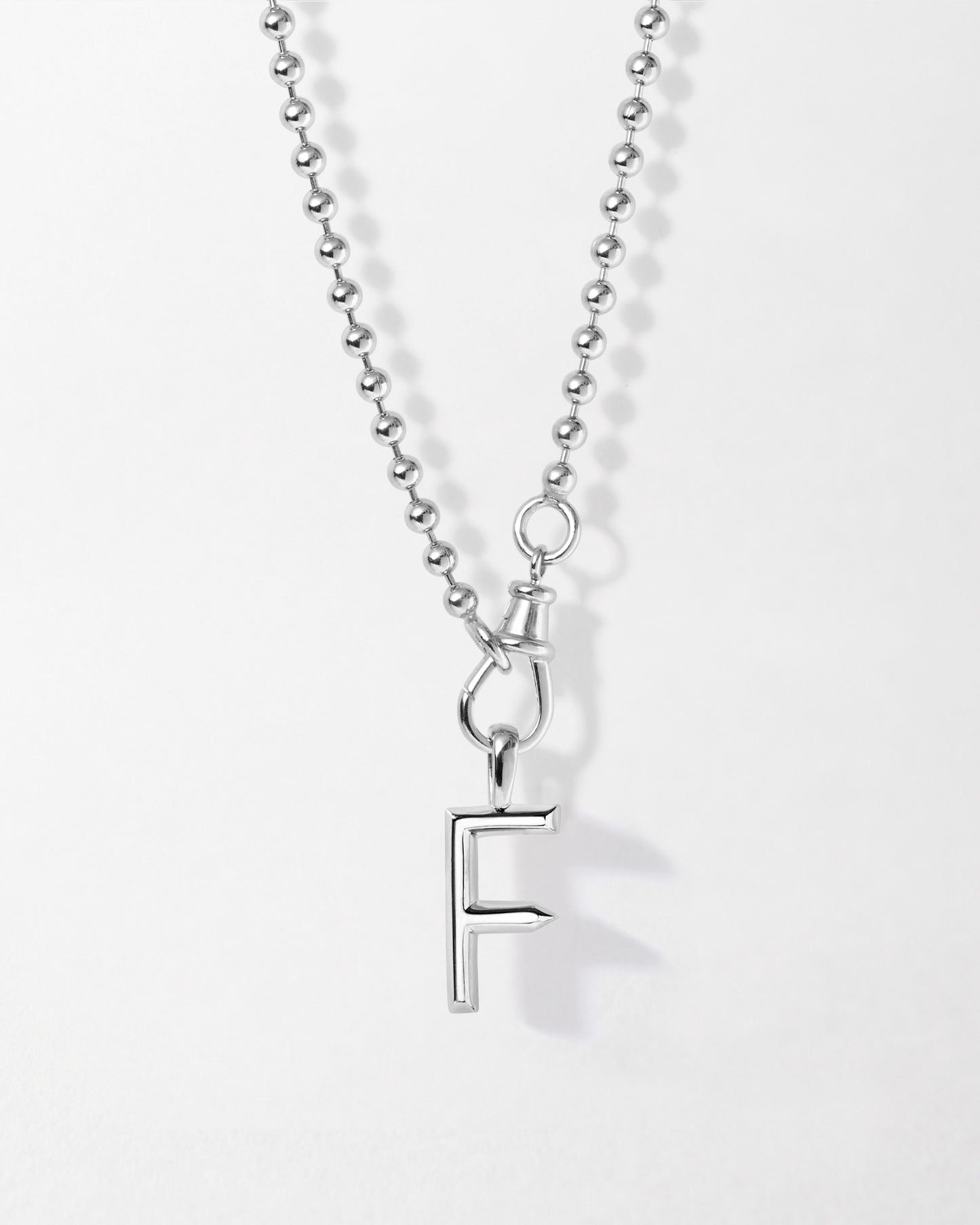 Initial Globe Necklace - Silver featuring a sleek sterling silver pendant with the letter F on a ball chain, crafted from recycled metals for ethical, everyday fine jewellery.