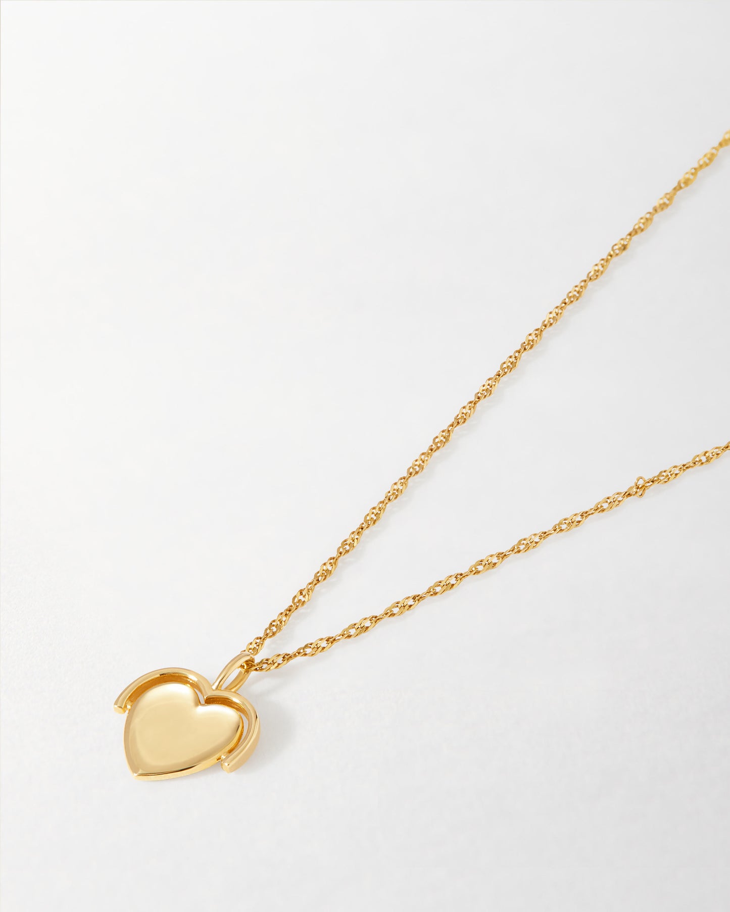 Solid Gold Heart Spinner Necklace