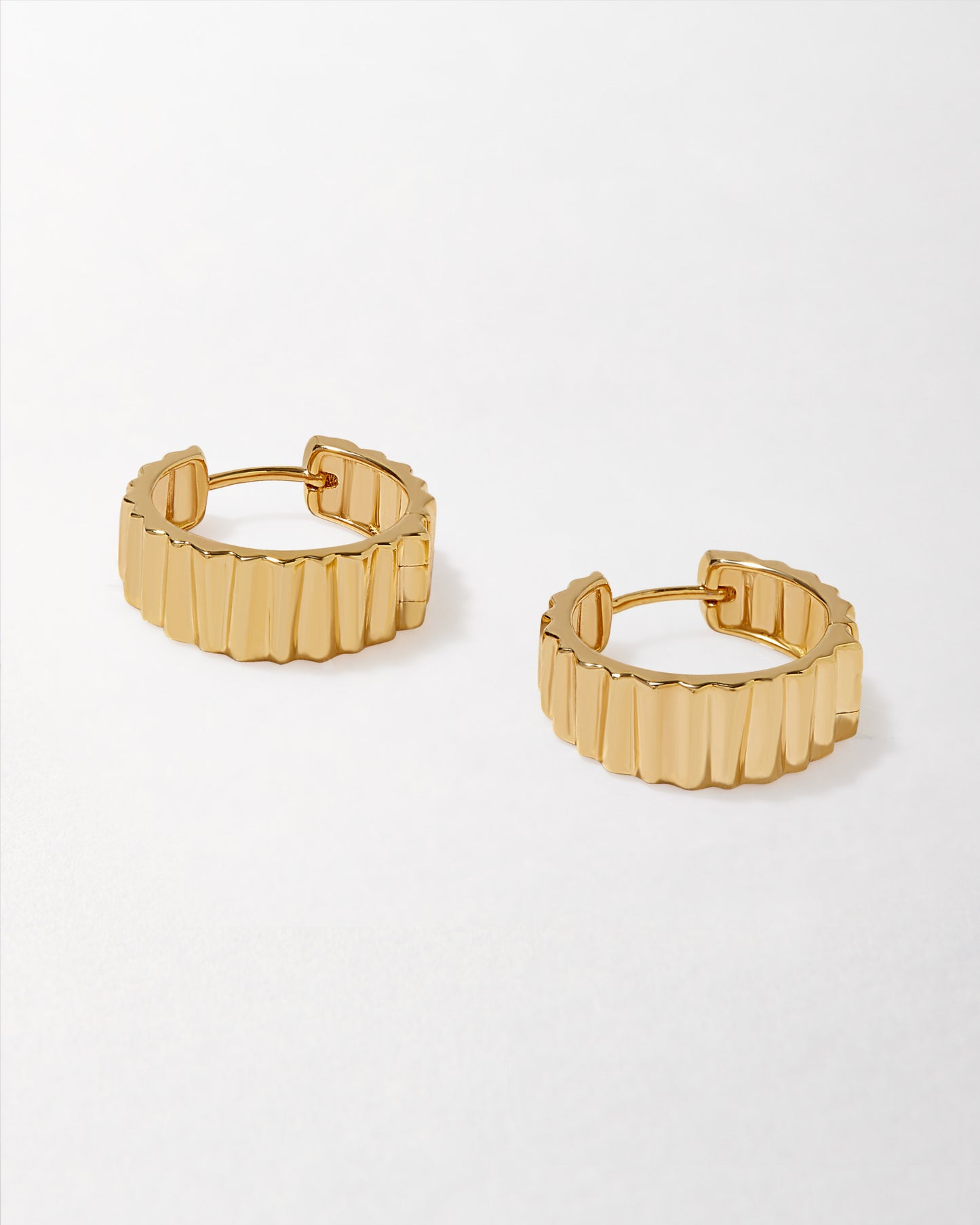 Flare Hoop Earrings - Gold featuring a ribbed design crafted from gold-plated sterling silver, made with recycled metals and ethical sourcing for everyday fine jewellery.