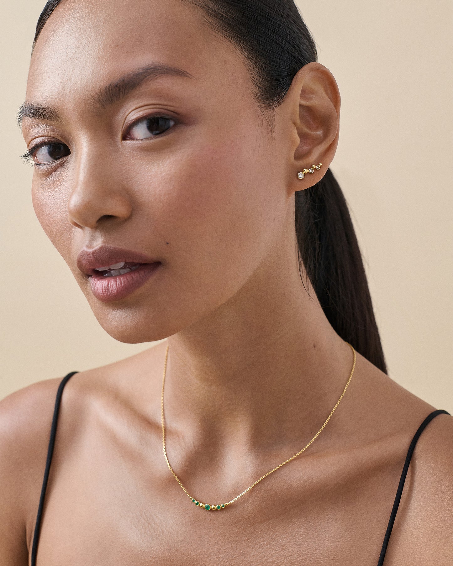 Globe White Sapphire Ear Crawler