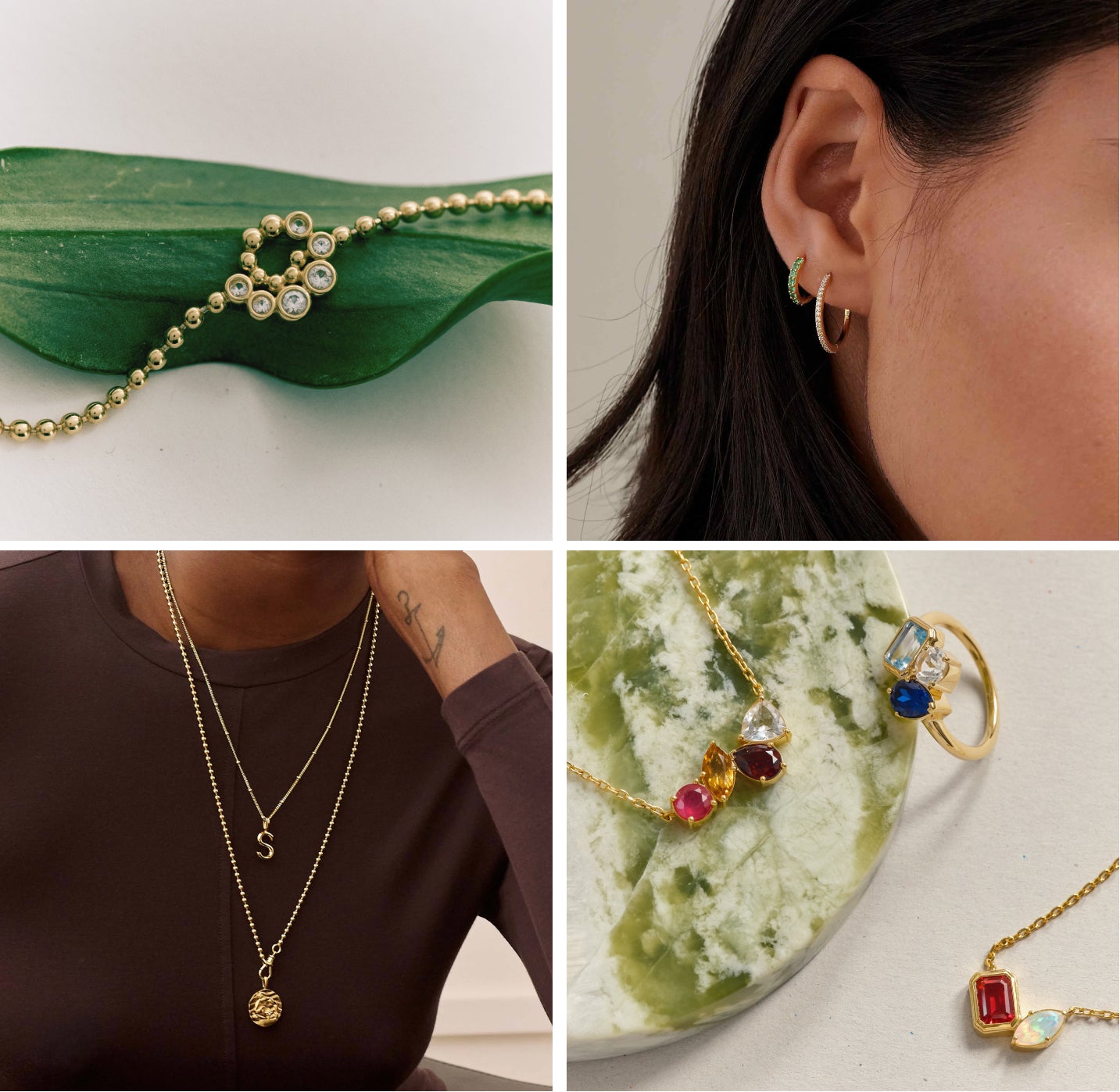 Close-up shots of delicate gold jewellery including a beaded bracelet with small diamonds on a green leaf, gold hoop earrings and green studs worn on an ear, layered gold necklaces with pendants on a person wearing a dark top, and gold pendants with colorful gemstones displayed on a textured green surface.