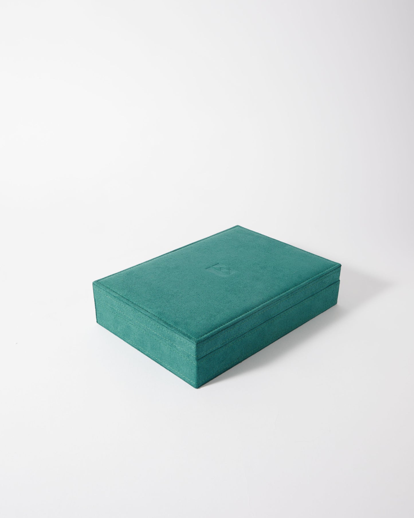 Edge of Ember Jewellery Box in teal green with a soft, sustainable finish, designed for fine jewellery storage made from recycled materials, built to last.