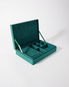 Open green velvet Edge of Ember Jewellery Box with multiple compartments and ring slots, designed for organising fine solid gold and lab-grown diamond pieces, crafted sustainably.