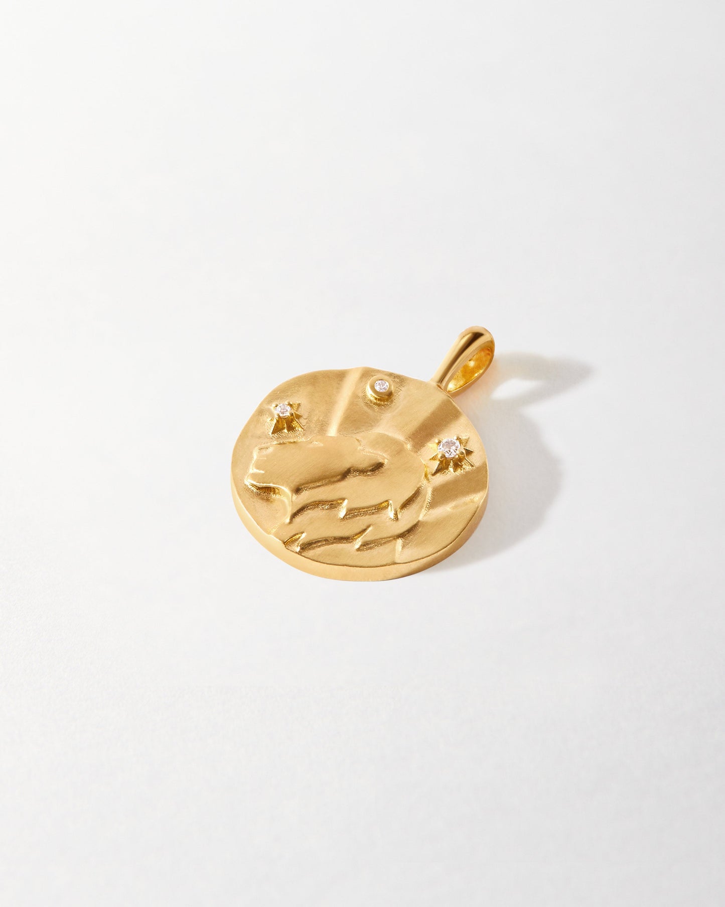 Zodiac Horoscope Pendant crafted from solid 14ct recycled gold with lab-grown diamonds, featuring an engraved lion design, combining ethical sourcing with fine jewellery for everyday wear.