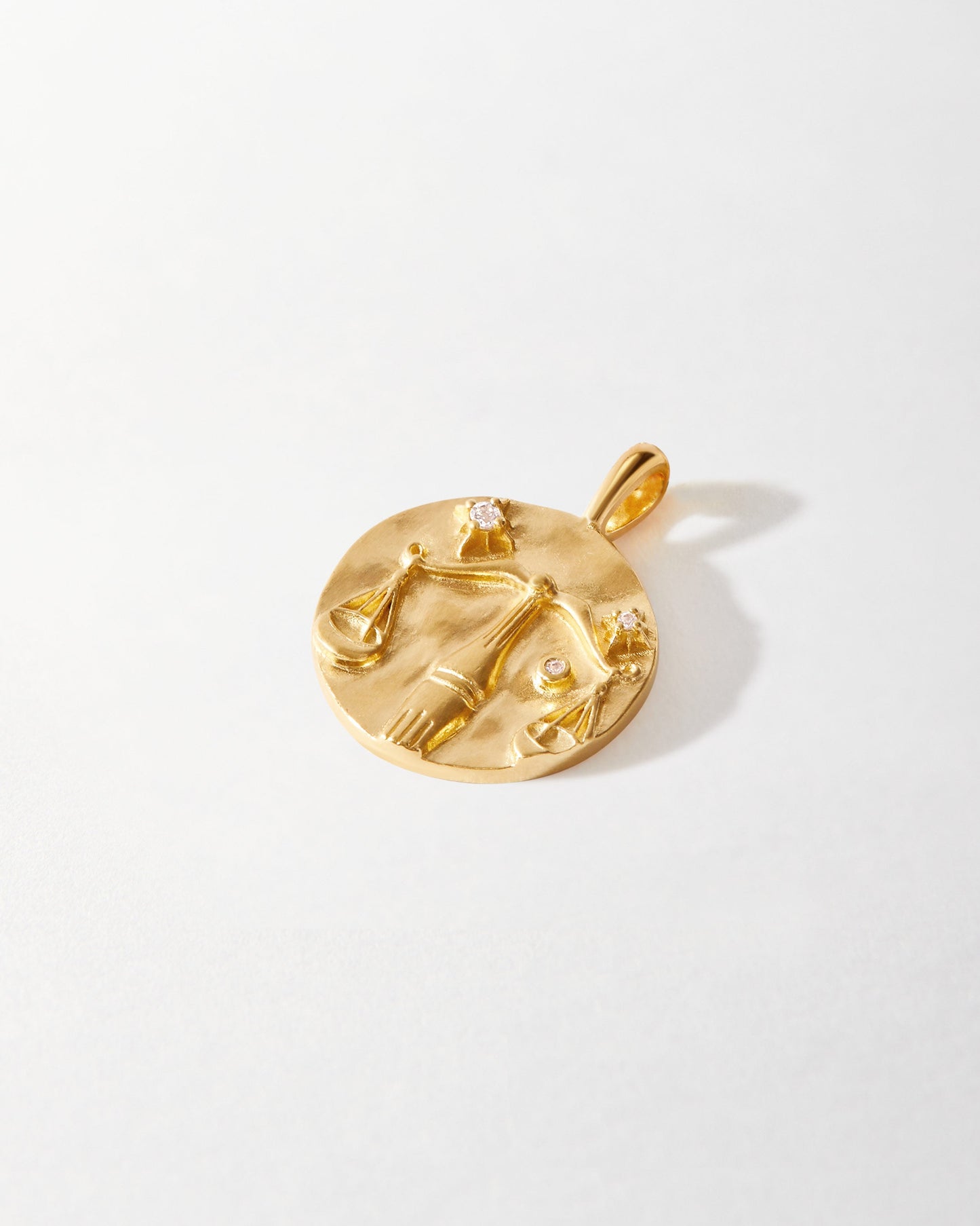 Zodiac Horoscope Pendant in solid 14ct gold featuring a Libra scale design with lab-grown diamond accents, crafted from recycled metals for considered everyday fine jewellery.