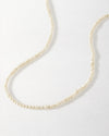 Mini Pearl Strand featuring delicate beaded pearls on gold-plated and sterling silver chain, combining considered jewellery with sustainable, ethical sourcing and timeless style.
