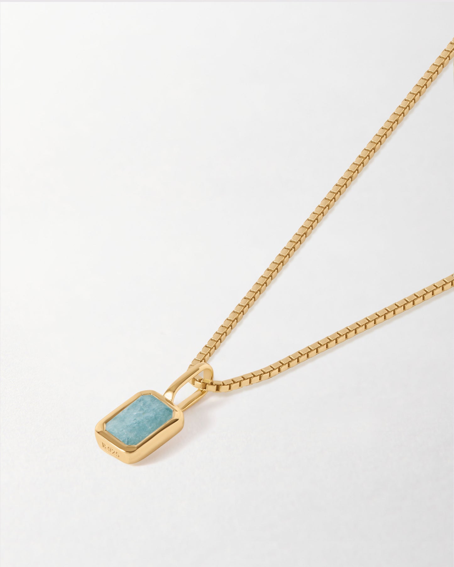 Mini Deco Aquamarine March Birthstone Necklace featuring a gold-plated pendant with an aquamarine stone on a sleek chain, crafted with recycled metals and ethical sourcing.
