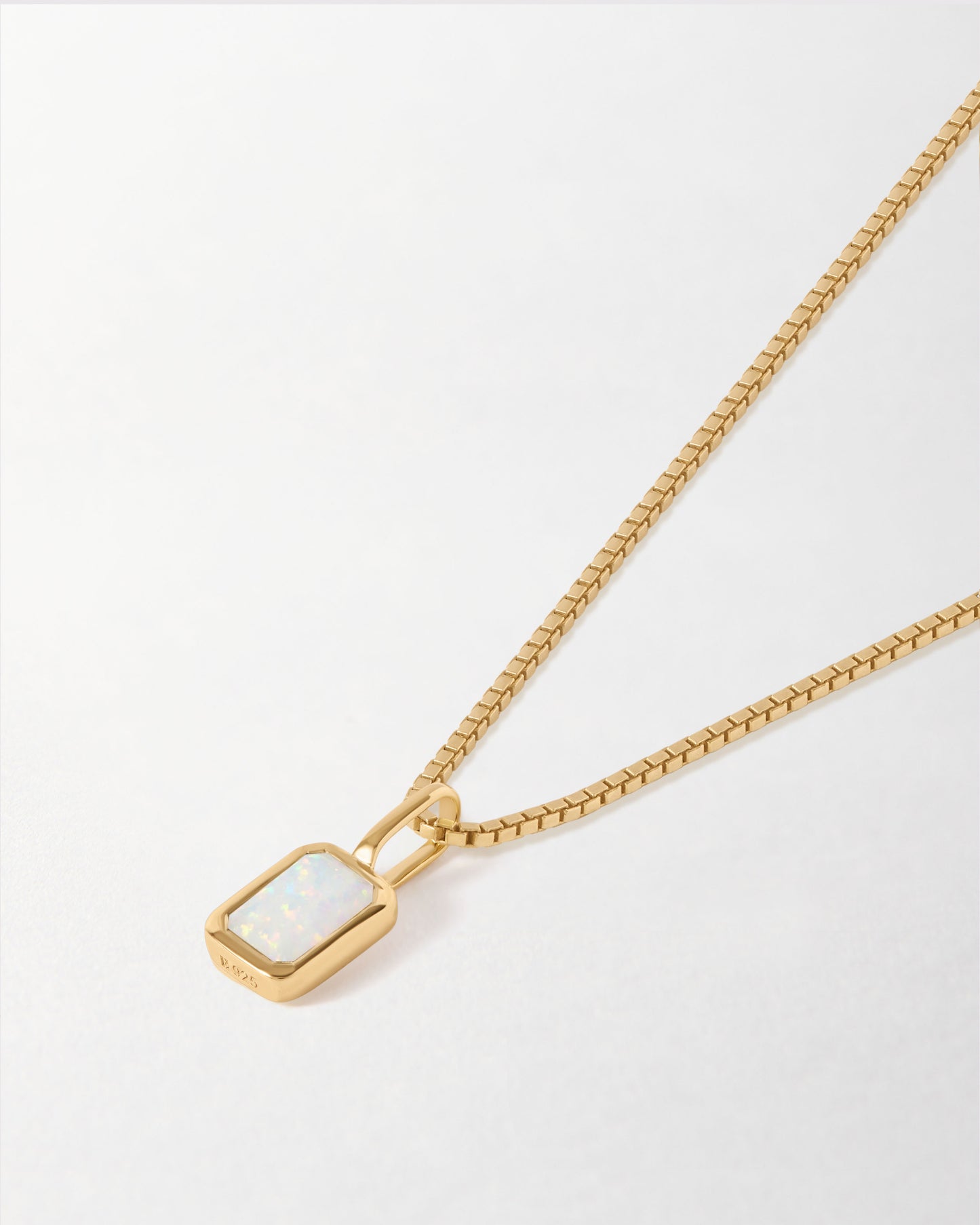 Mini Deco Opal October Birthstone Necklace featuring a gold-plated pendant with a shimmering opal on a fine chain, crafted from recycled metals and built to last.