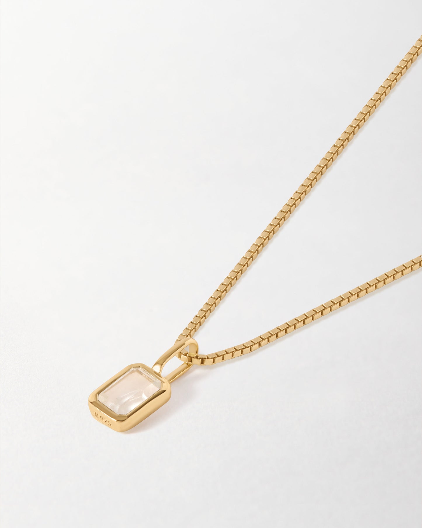 Mini Deco White Topaz April Birthstone Necklace featuring a gold-plated pendant and chain, crafted with recycled metals and designed as considered jewellery built to last.