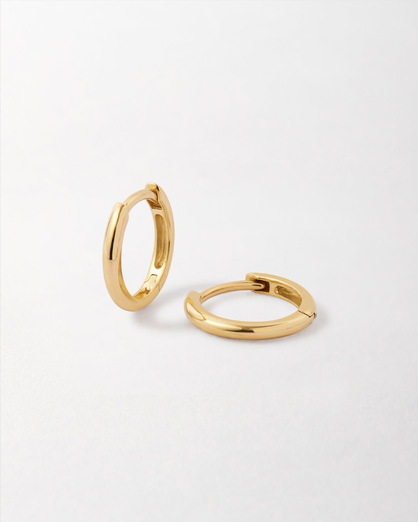 Solid Gold Mini Huggie Hoop Earrings