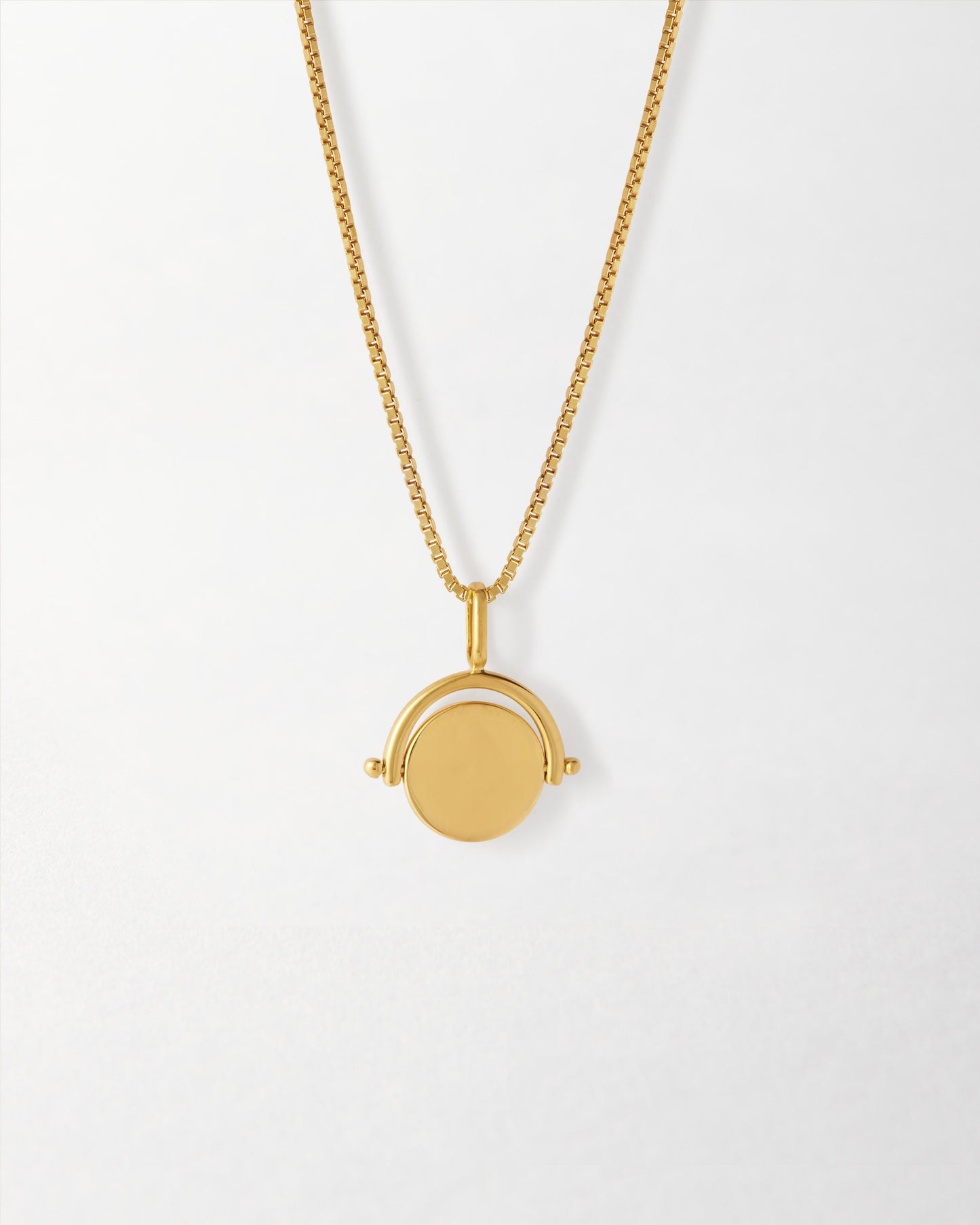 Mini Spinner Necklace in gold-plated sterling silver featuring a delicate pendant and chain, crafted with recycled metals for fine, considered jewellery built to last.