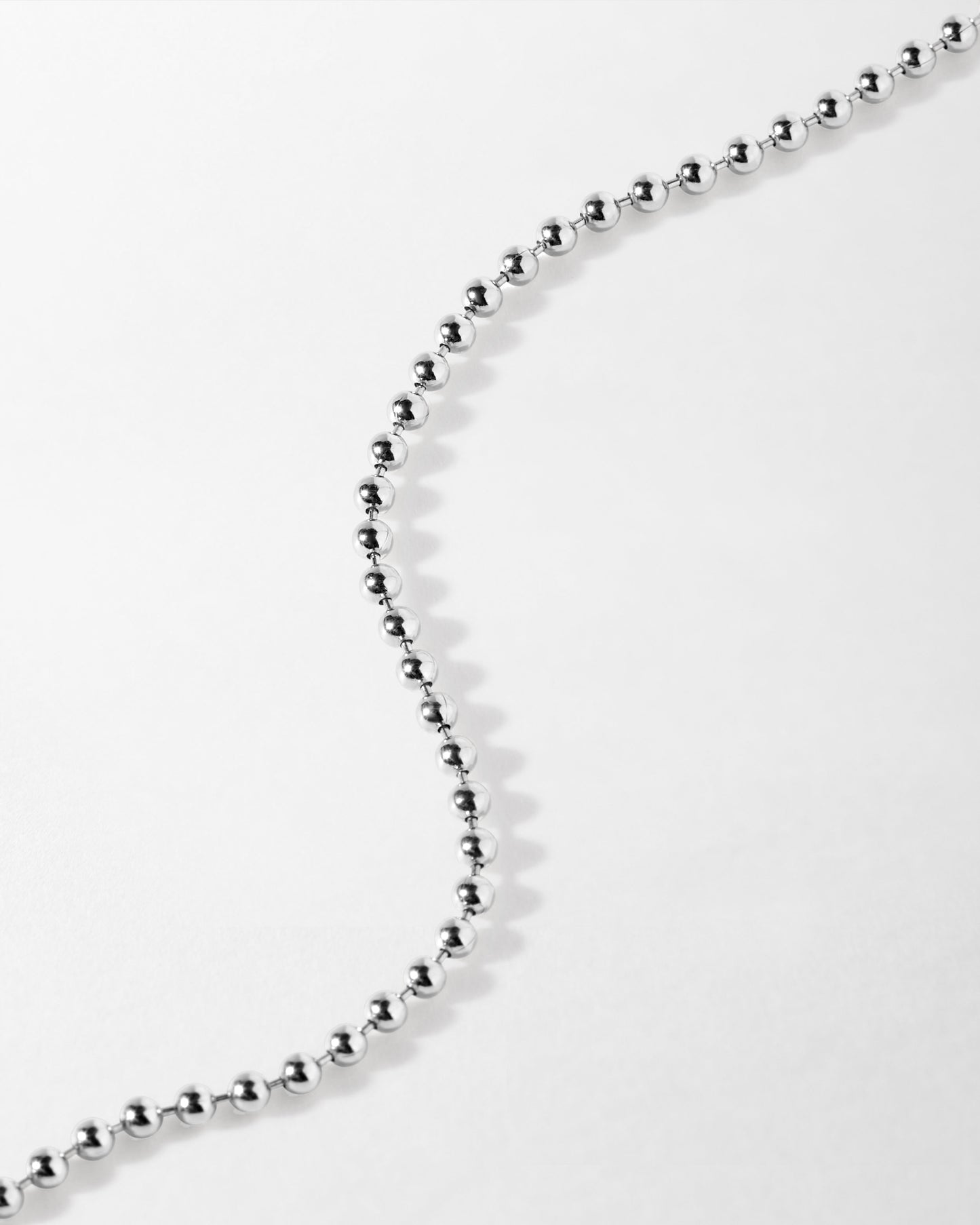 Deco White Topaz Globe Bracelet - Silver featuring a sterling silver beaded chain with a sleek swivel clasp, crafted as considered jewellery in recycled metals.