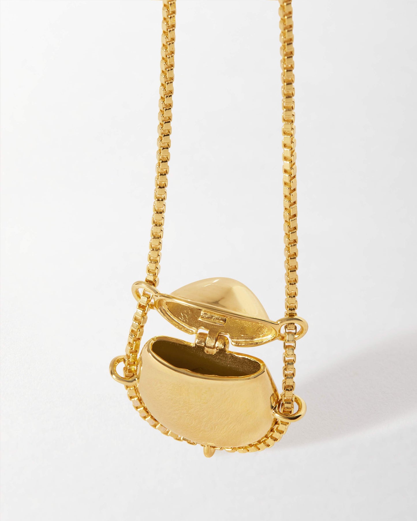 Secret Message Locket Necklace in gold-plated sterling silver with a pendant design, featuring an open locket on a matching chain, crafted from recycled metals and built to last.