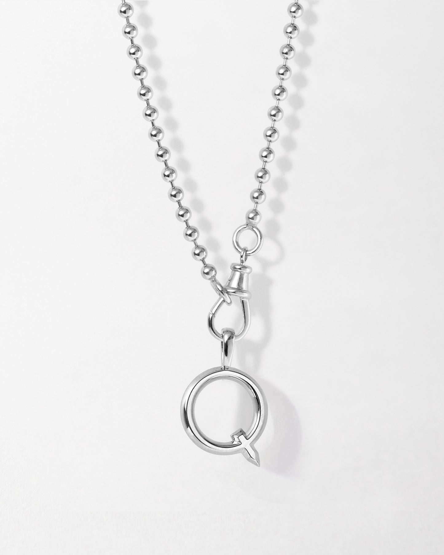 Initial Globe Necklace - Silver featuring a sterling silver pendant with an elegant Q letter design on a delicate ball chain, crafted from recycled metals for everyday fine jewellery.