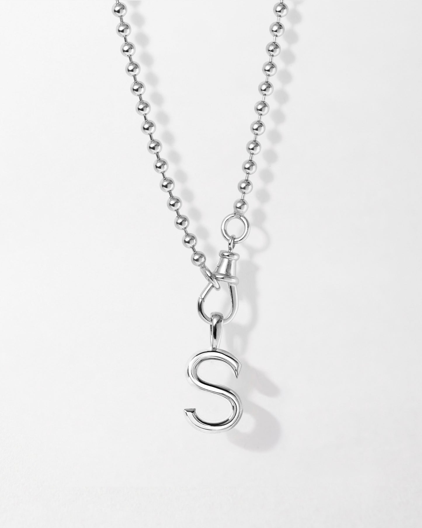 Initial Globe Necklace - Silver featuring a sterling silver pendant with the letter S on a beaded chain, crafted from recycled metals for considered, fine jewellery made to last.