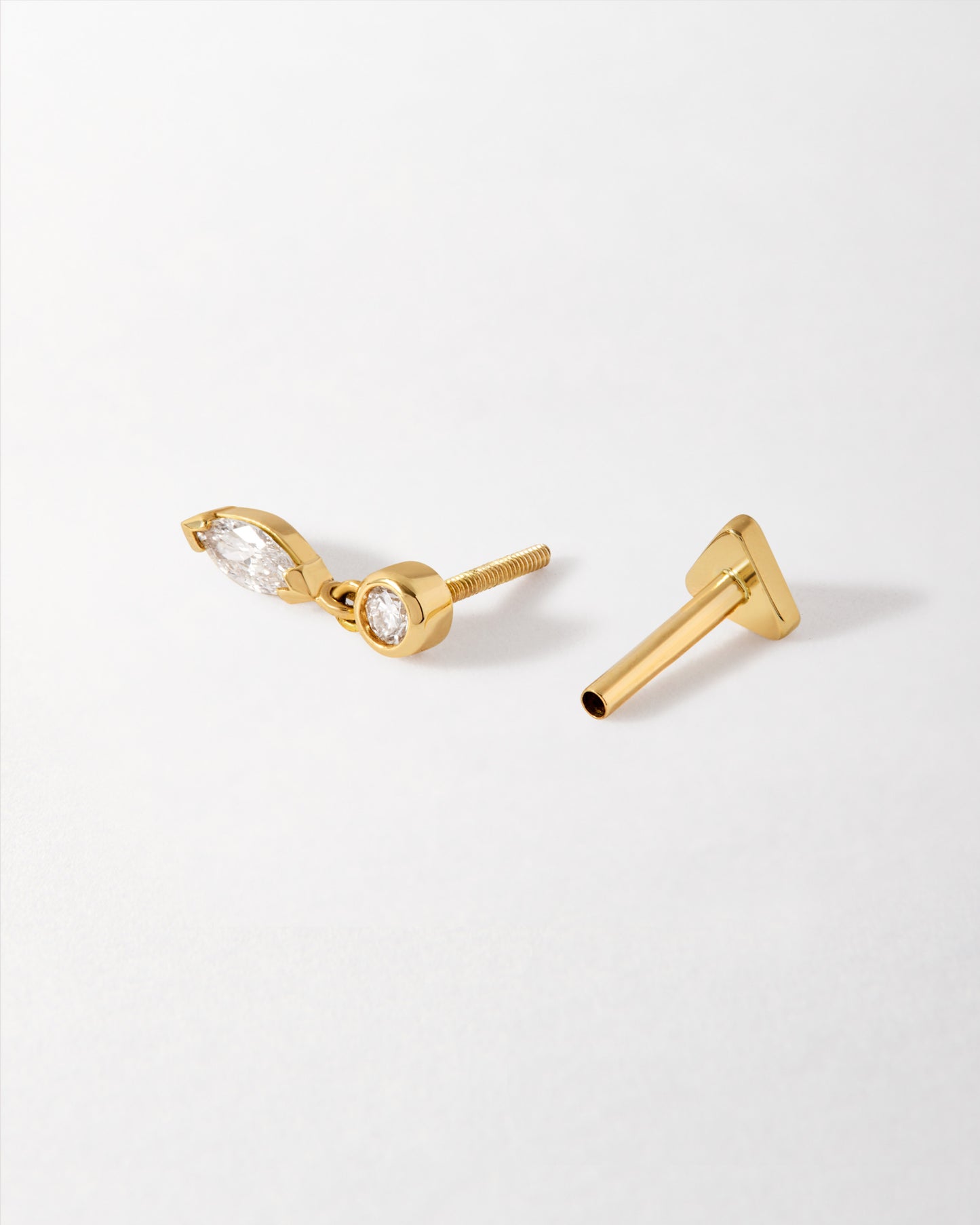 Solid Gold Lab-Grown Marquise Diamond Piercing Earring featuring a stud design with recycled 14ct gold and ethically sourced lab-grown diamonds, crafted for everyday fine jewellery.