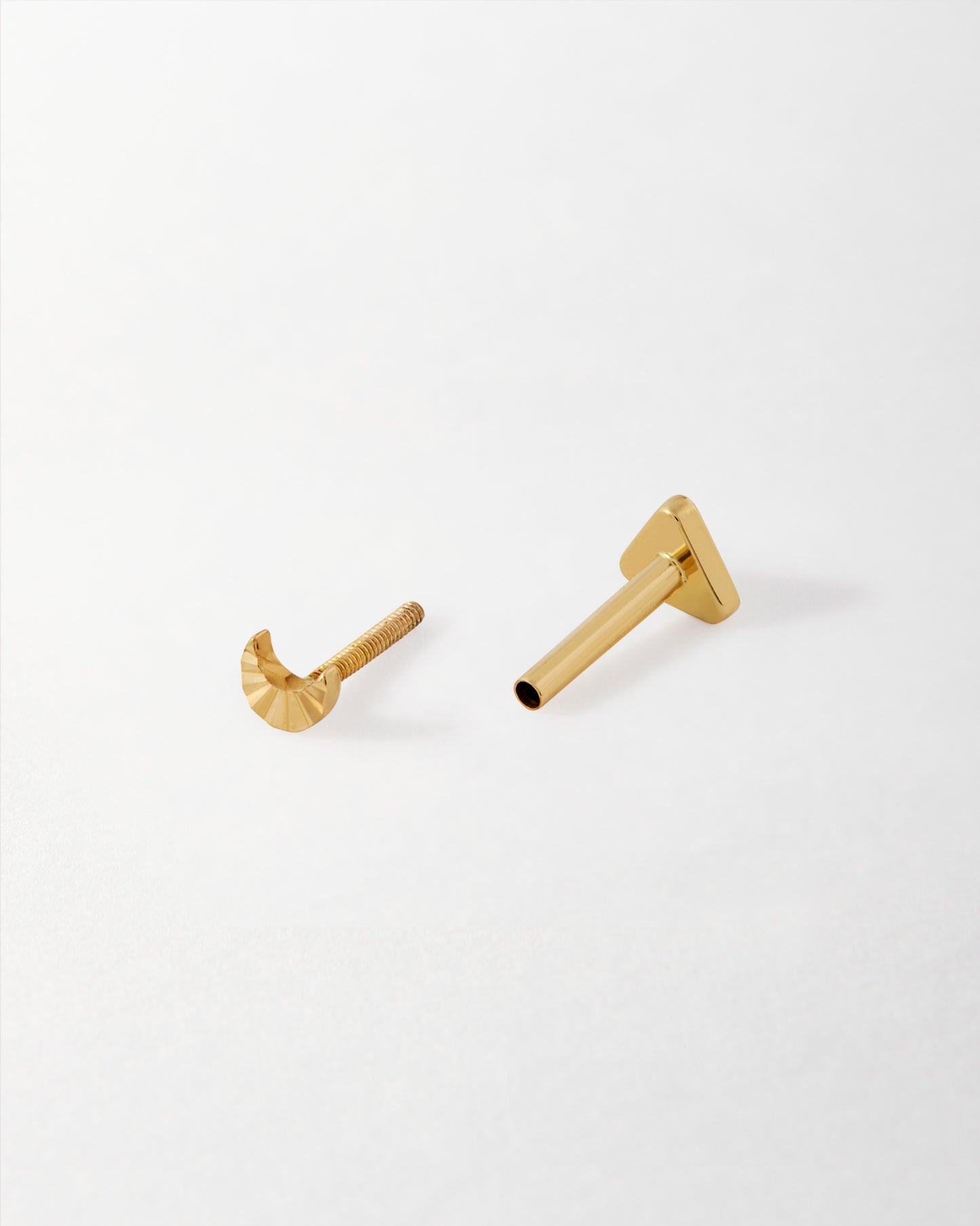 Solid Gold Moon Piercing Earring in 14ct gold, crafted with recycled metals for ethical, considered jewellery designed to last and be worn every day.