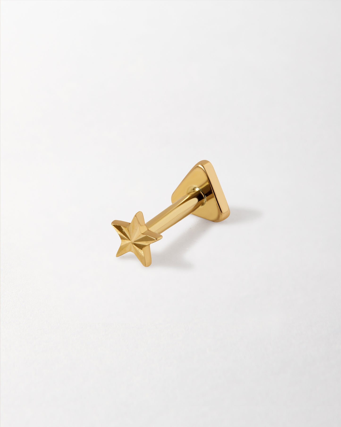 Solid Gold Star Piercing Earring