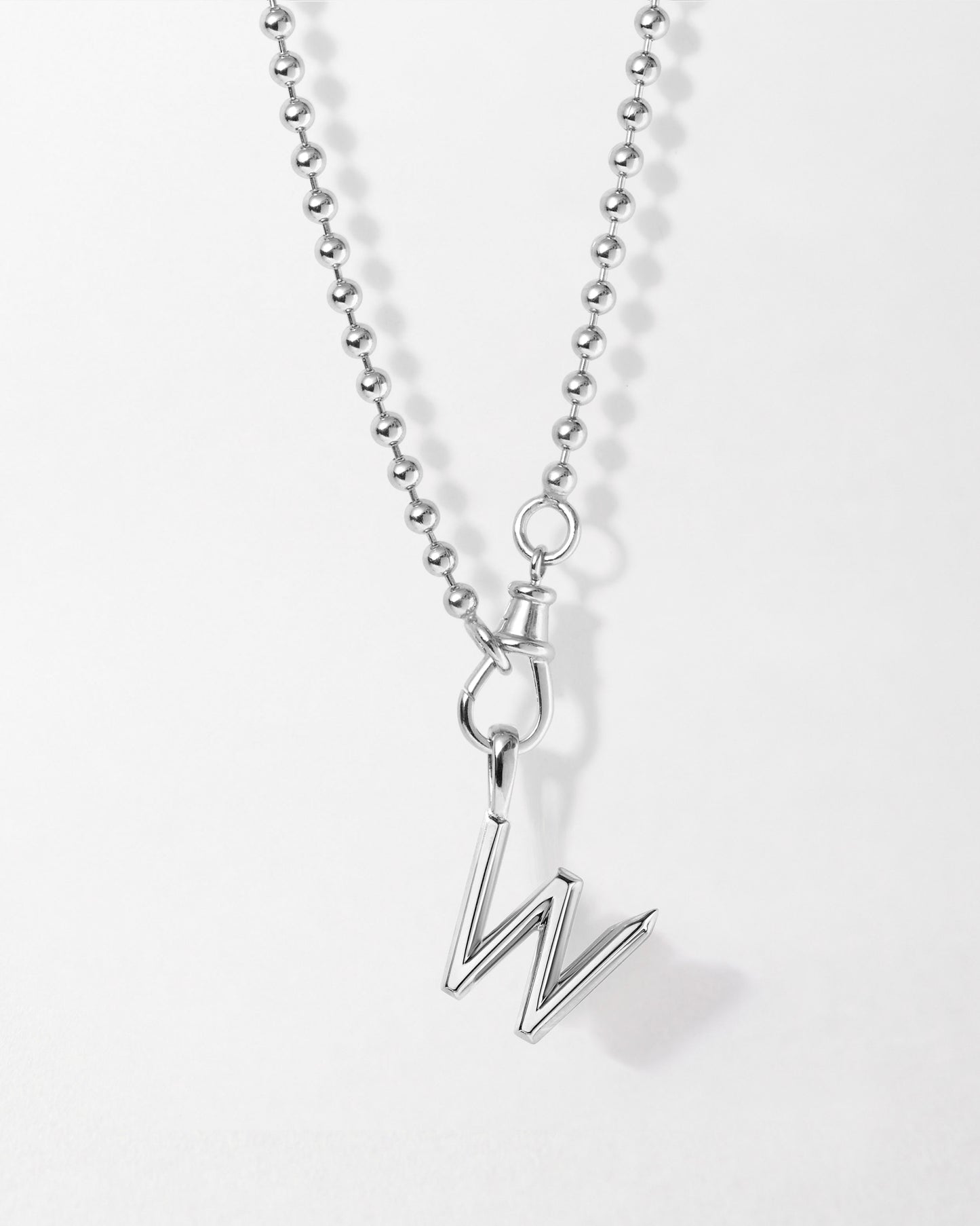 Initial Globe Necklace - Silver featuring a sterling silver pendant with a modern letter W charm on a ball chain, crafted with recycled metals and ethical sourcing.