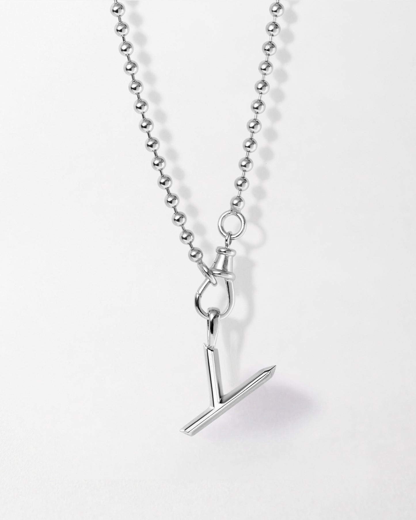 Delicate Initial Globe Necklace - Silver with a sleek sterling silver pendant on a fine chain, crafted from recycled metals for considered everyday fine jewellery.