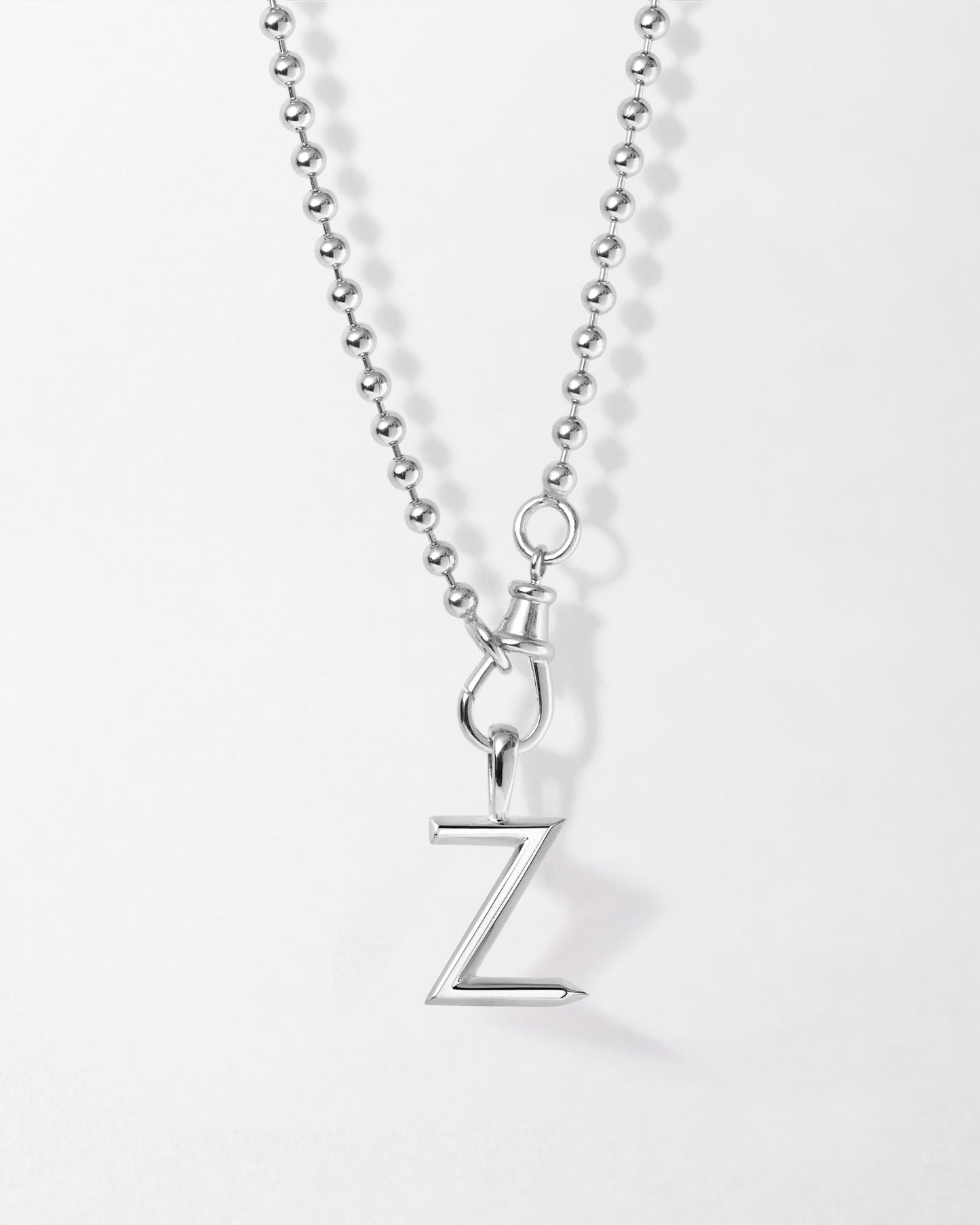 Initial Globe Necklace - Silver featuring a sleek sterling silver pendant shaped as the letter Z on a delicate bead chain, crafted with recycled metals for considered fine jewellery.